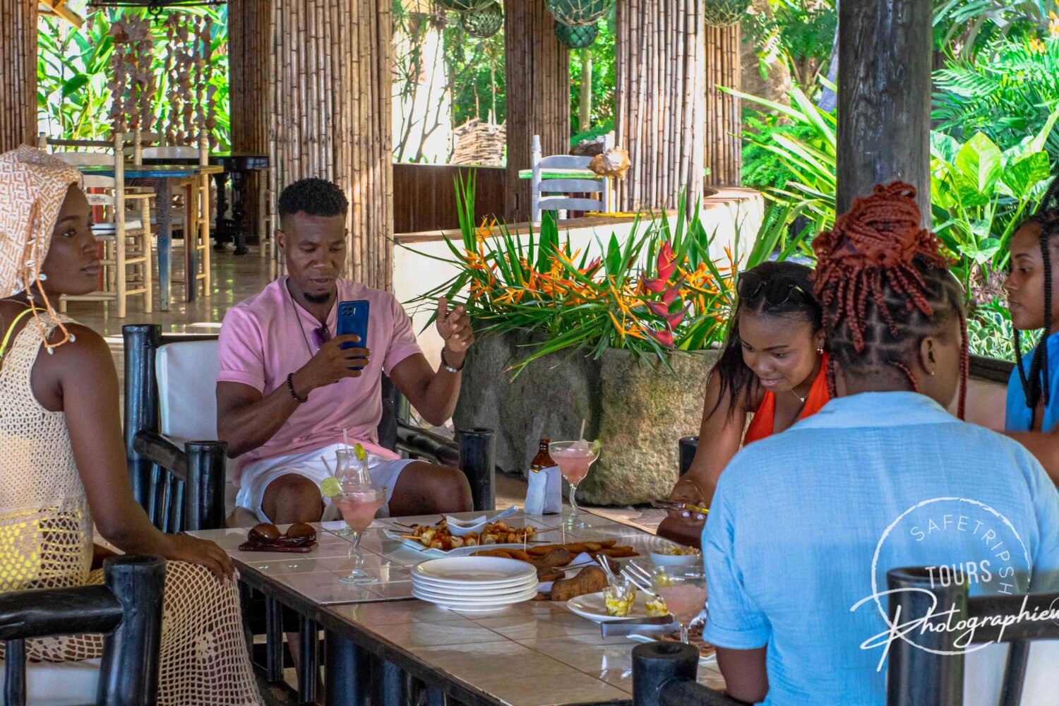 Tourists enjoying a meal at the Auberge du Parc in Dondon